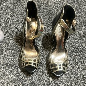 BeBe woman’s black and gold heel worn a couple times size 7